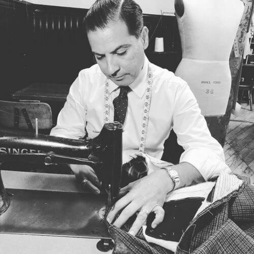 Robinson at work with the sewing machine