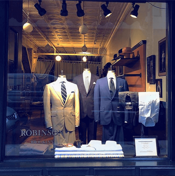 Three suit display in the store window