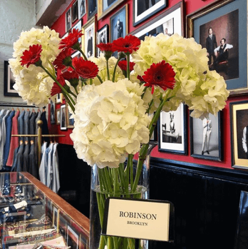 White and Red flowers on display in the store