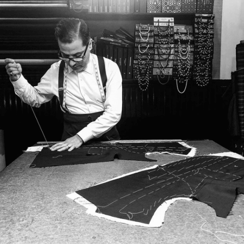 Robinson stitching a new suit pattern