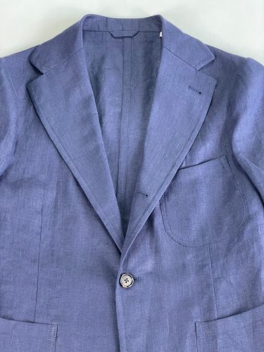 Collar of light blue suit jacket