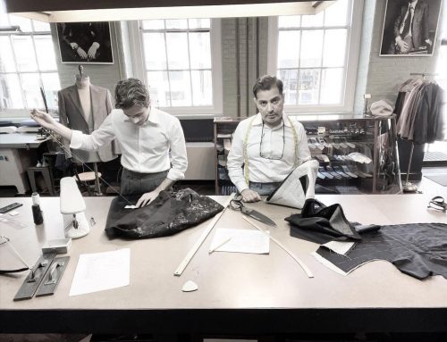 Black and white photo of two tailors hard at work