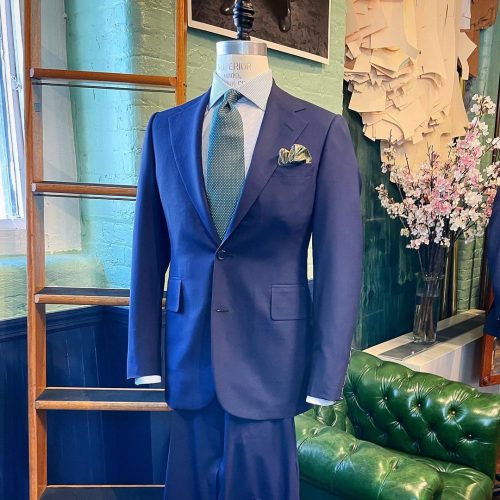 A navy blue suit on display